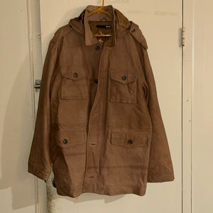 Tan leather jacket/coat. Brand:Blue never worn.
